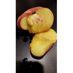 Pêche plate jaune, chair jaune parfumée et juteuse | La Hunelle